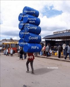 A meme of a person carrying nine large blue barrels on their shoulders. Text overlaid on the barrels reads, from top to bottom: recruiting, tragedy, remote work, learning, comp, unrest, COVID, politics, RIFs. Text overlaid on the person carrying the barrels reads "HR."