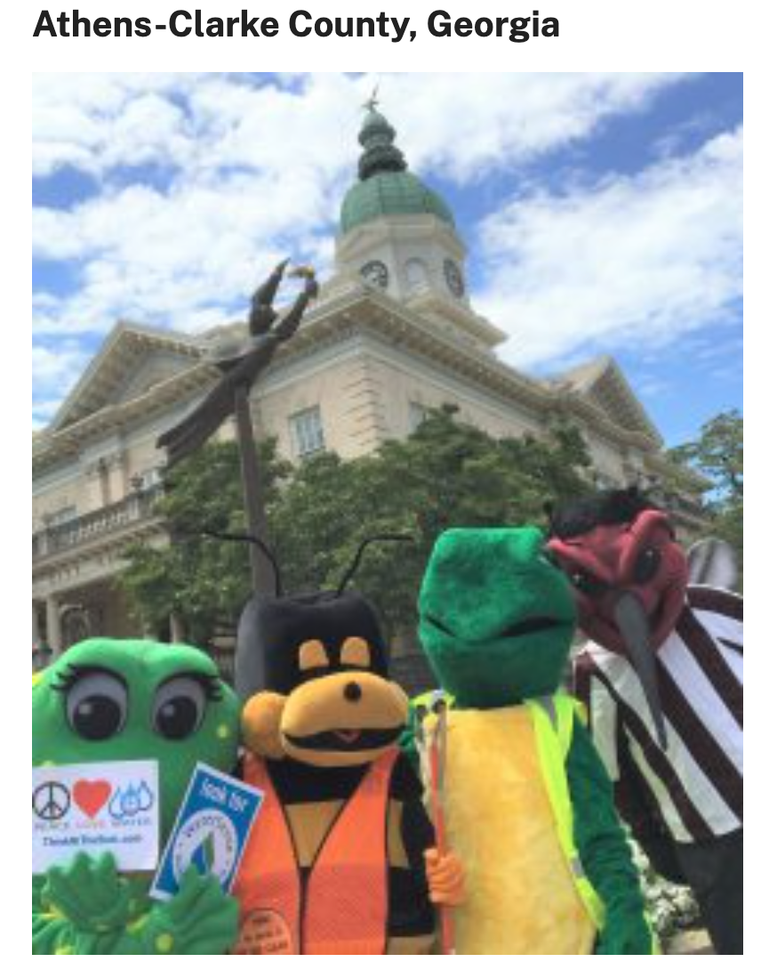 Mascots stand in front of the Athens-Clarke County, GA, for a City Hall Selfie.