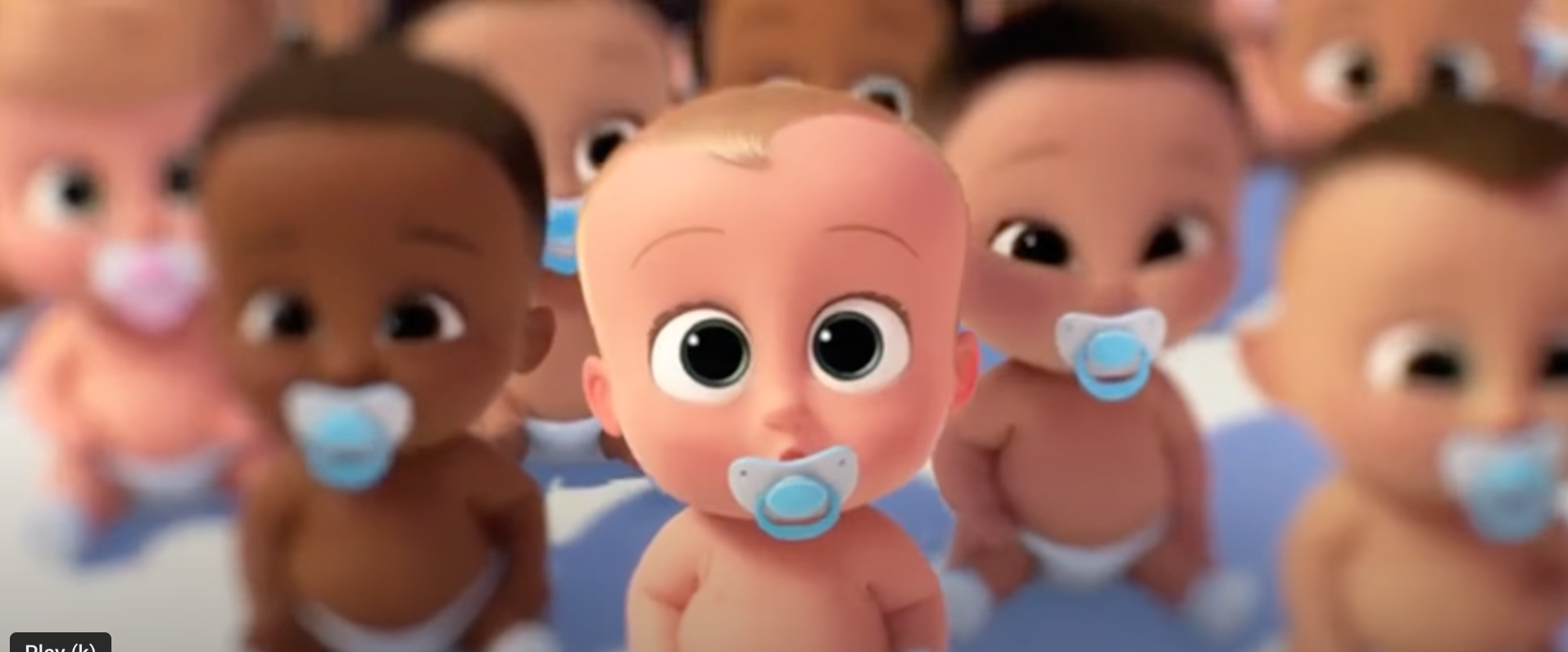 A scene from the animated film "Boss Baby" where several babies with pacifiers look directly toward the viewer.