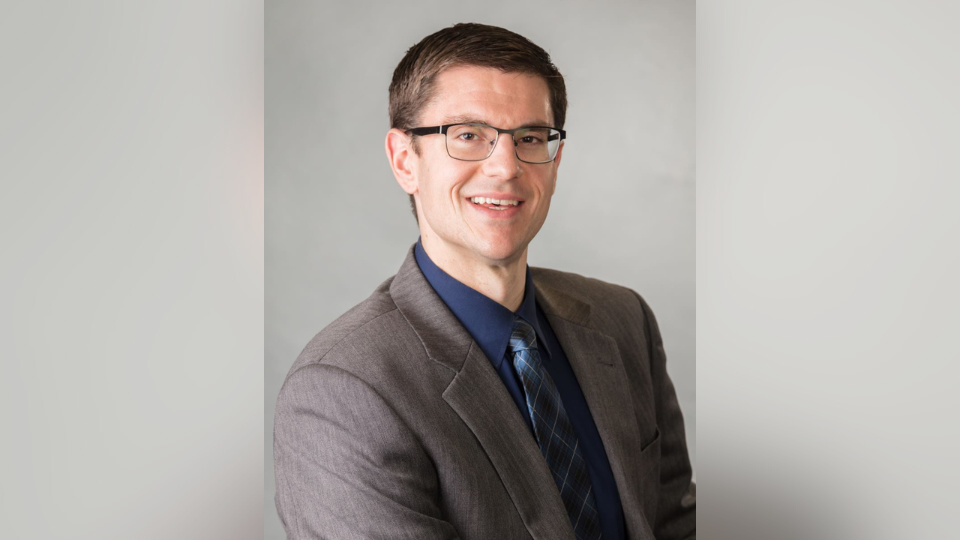 A headshot of Gabe Reaume, city manager of Saginaw, TX and author of "Strangers and Angels: A Memoir."