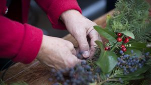 hands making a wreath