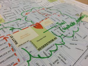 A photo of a map of Santa Ana on which someone has written in green marker.