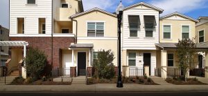 A group of townhomes in the daytime