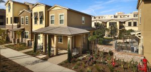 A group of townhomes in the daytime