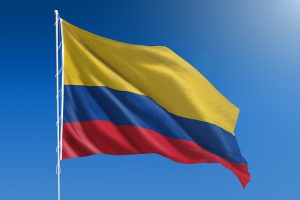 Colombian Flag Against a Blue Sky