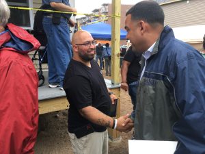 Marcia Garcia Congradulates Juan Gonzalez on Habitat Home