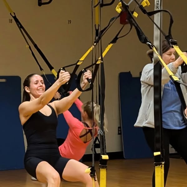 Fitness trainer Jessica doing TRX routine