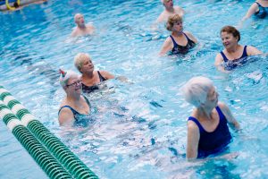 adults swimming