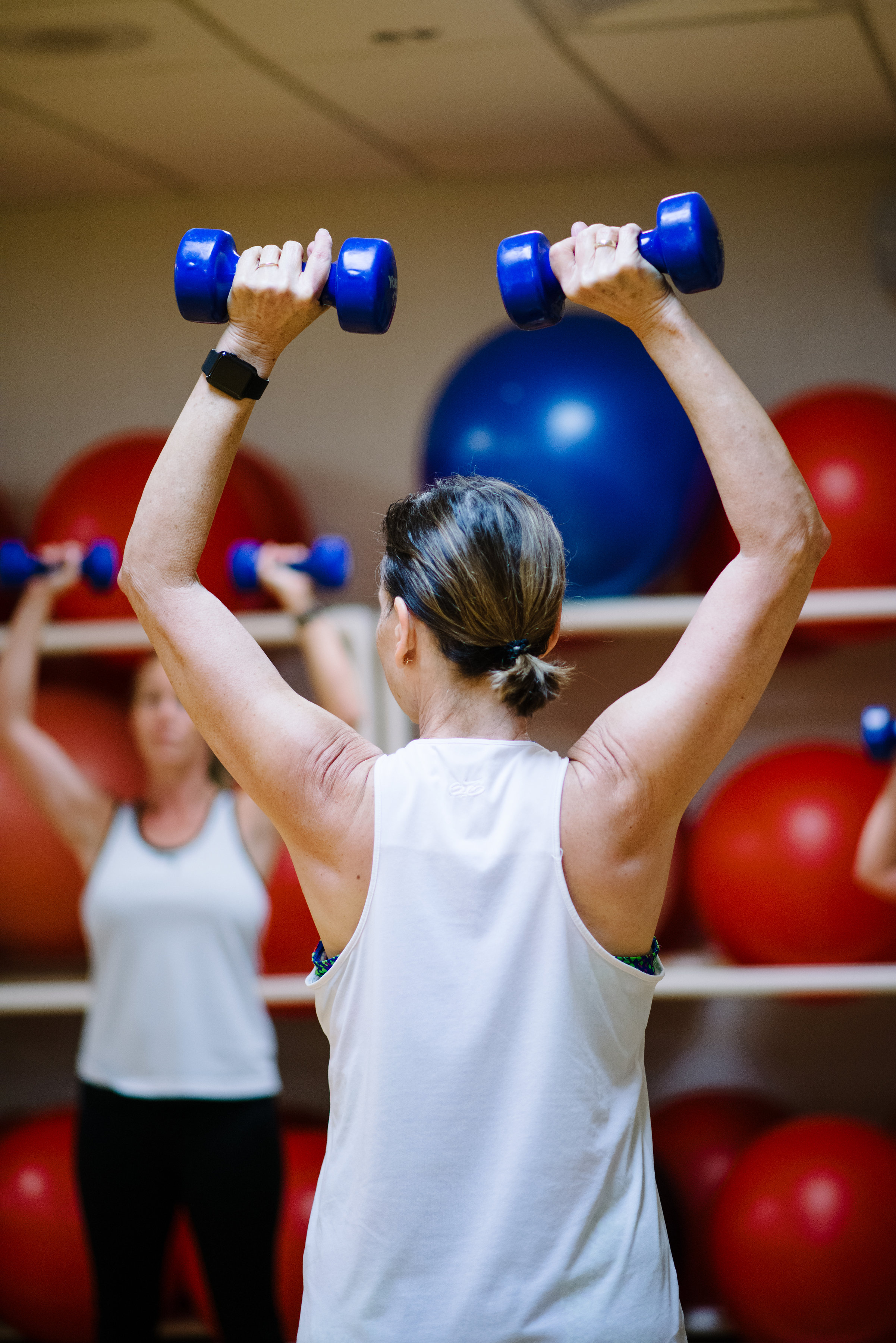 lifting dumbells