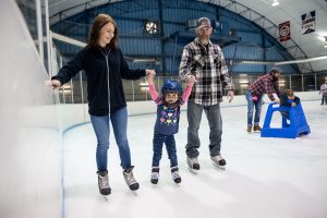 parents and child skating