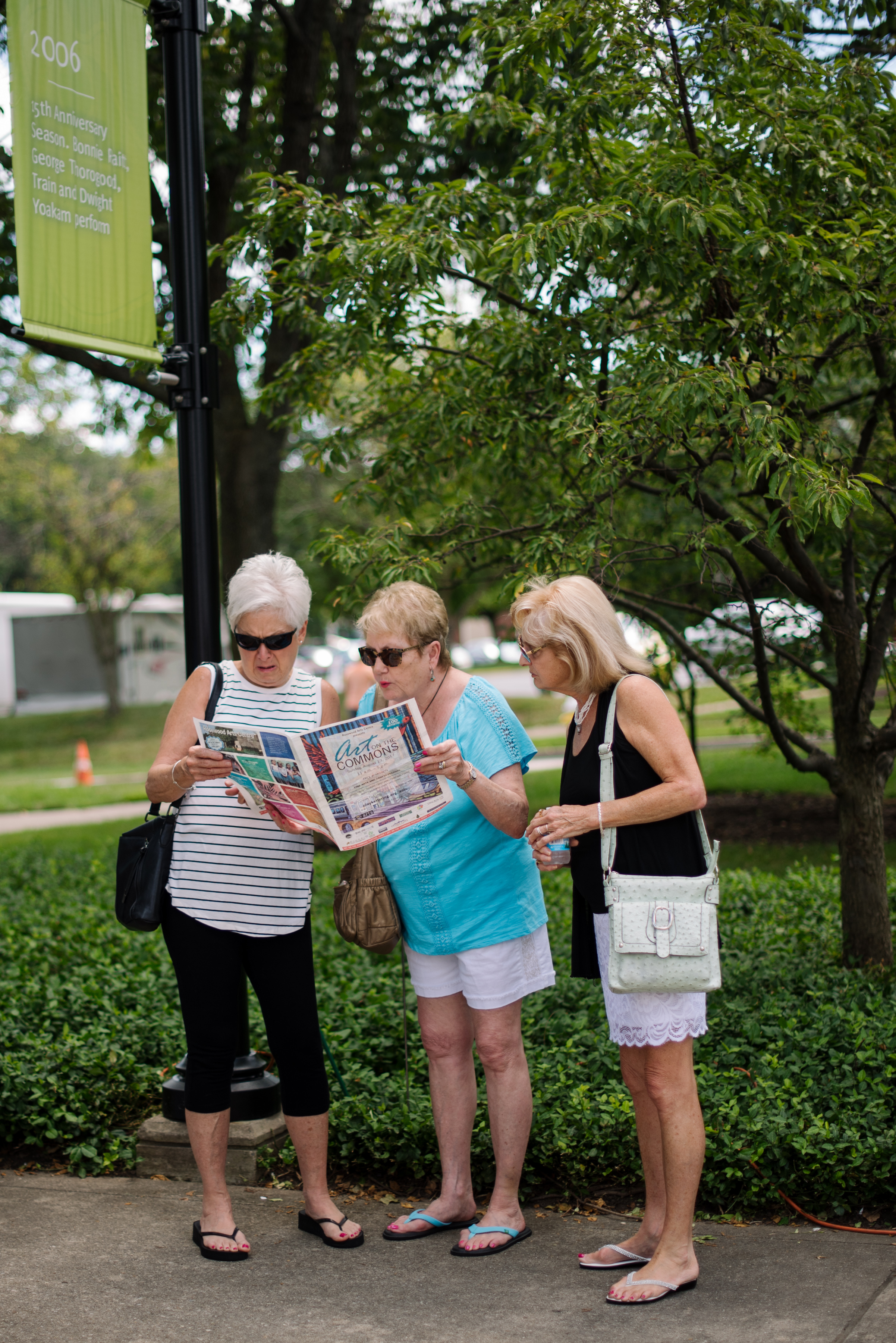 women reading map