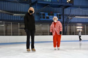 women ice skating