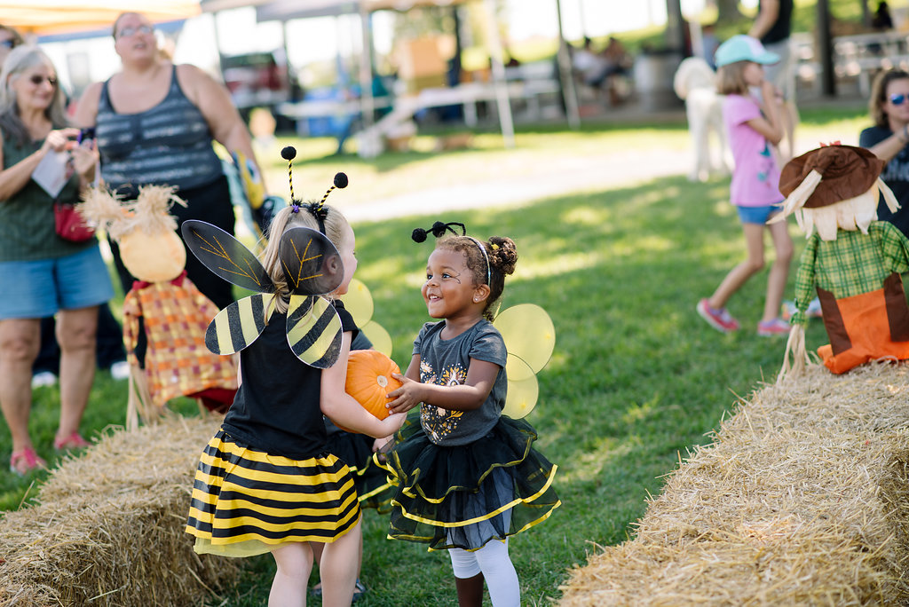 two girls with pumpkin