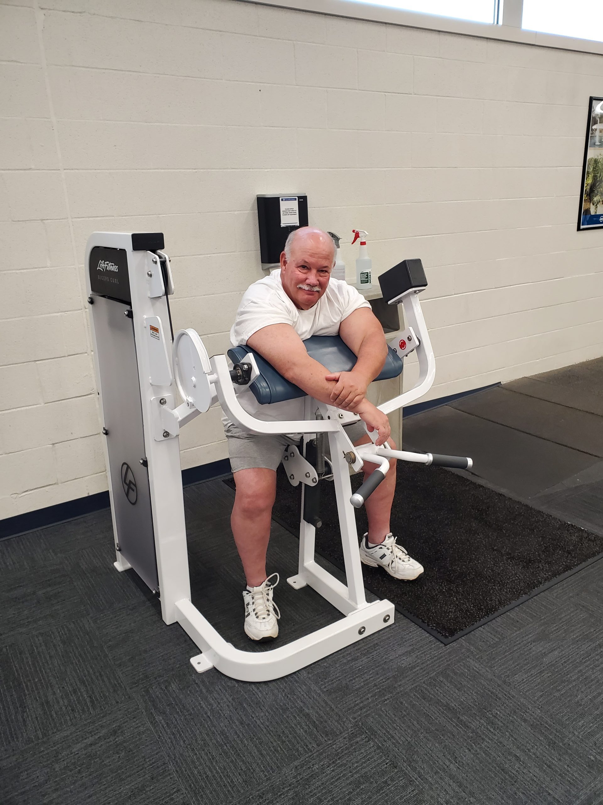 man on fitness machine