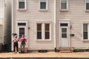 people outside townhouse