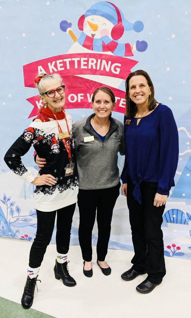 women with holiday backdrop