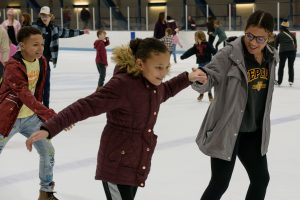 people ice skating