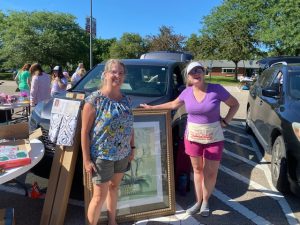 women at flea market