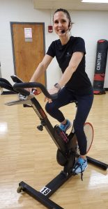 woman on exercise bike