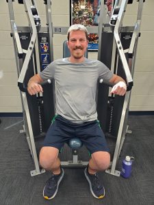 man using fitness equipment