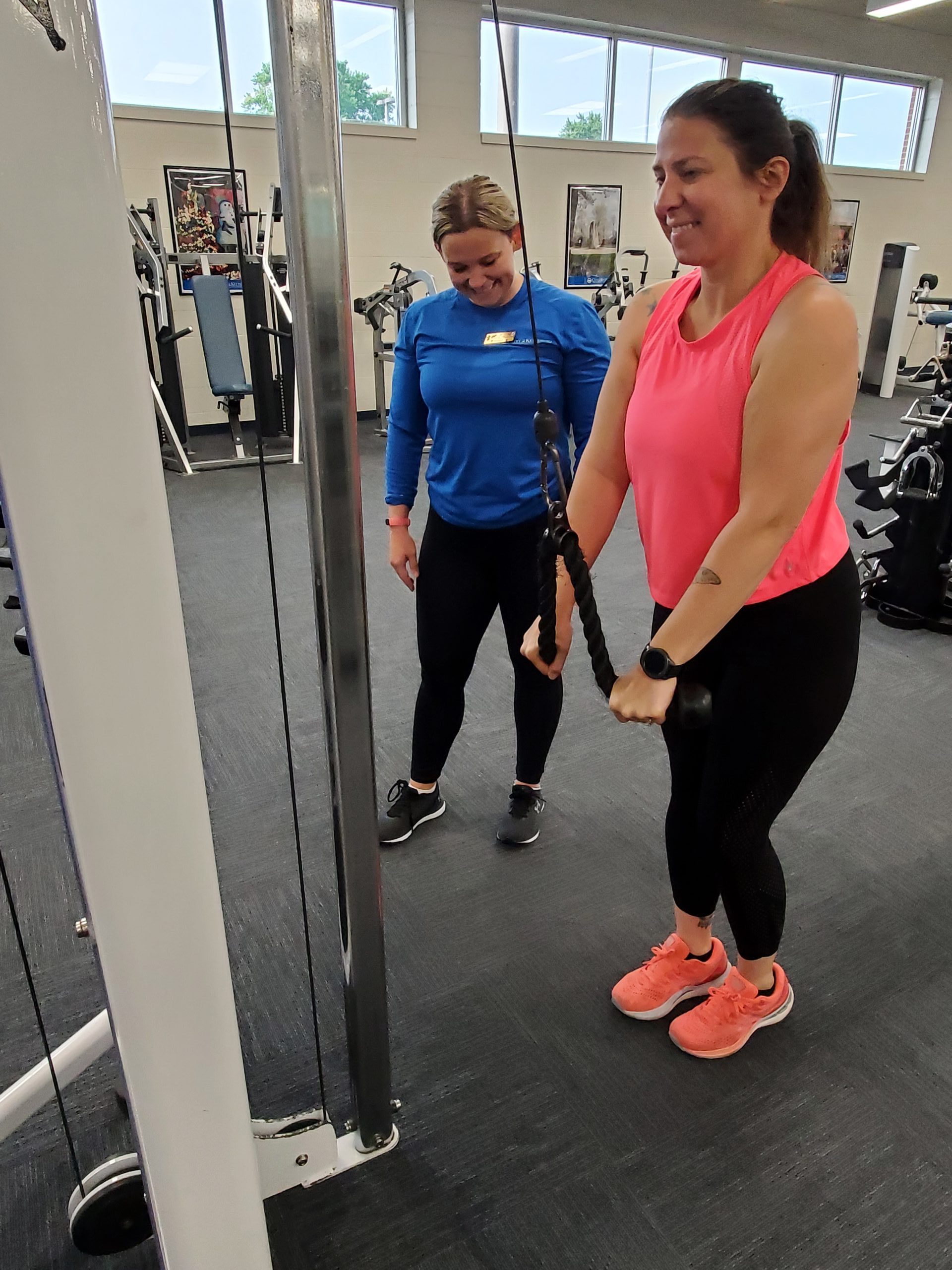 woman with personal trainer