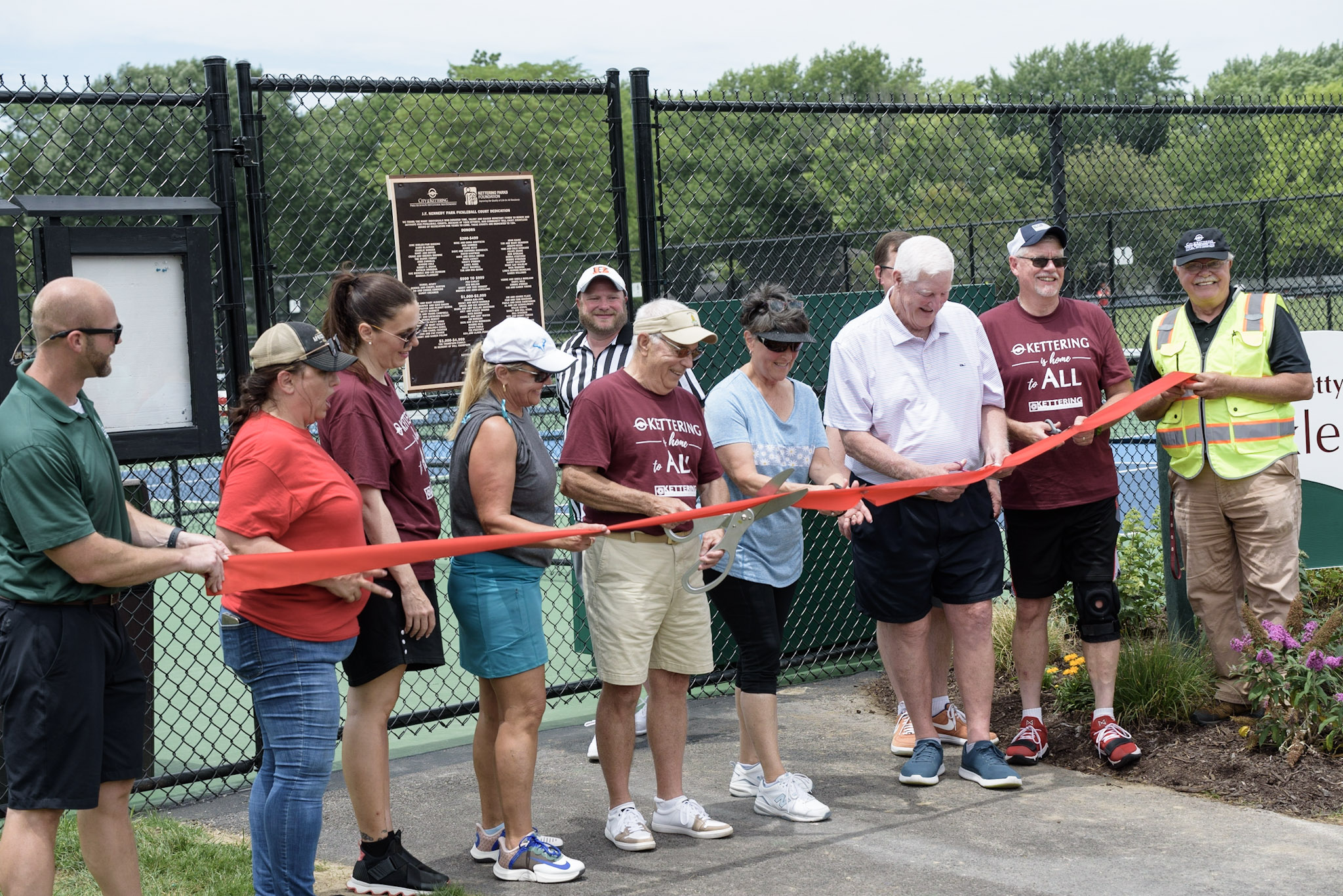 Image of the ribbon-cutting for the renovated Kennedy Pickleball Courts