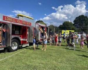 Fire Trucks and people at community event