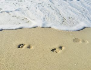 Beach sand and footprints