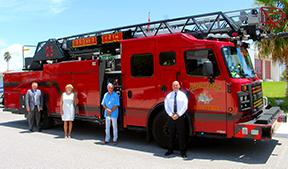 R-L Chief Belk, Mayor John Hendricks, Commissioner Helen Price, City Manager Bob Daniels