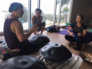 John Guinta slapping the drums for Yoga