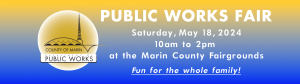 blue and yellow banner with the words "Public works fair" on it.