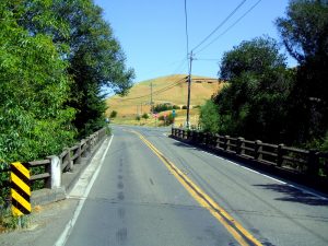 View of approach to Nicasio Valley Road Bridge