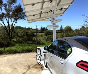 car charging at a solar charger unit