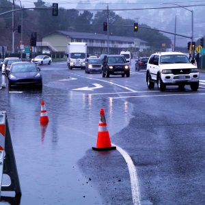 Roadway flooding at the entrance to Manzanita Park & Ride in Tam Valley, Marin County. 