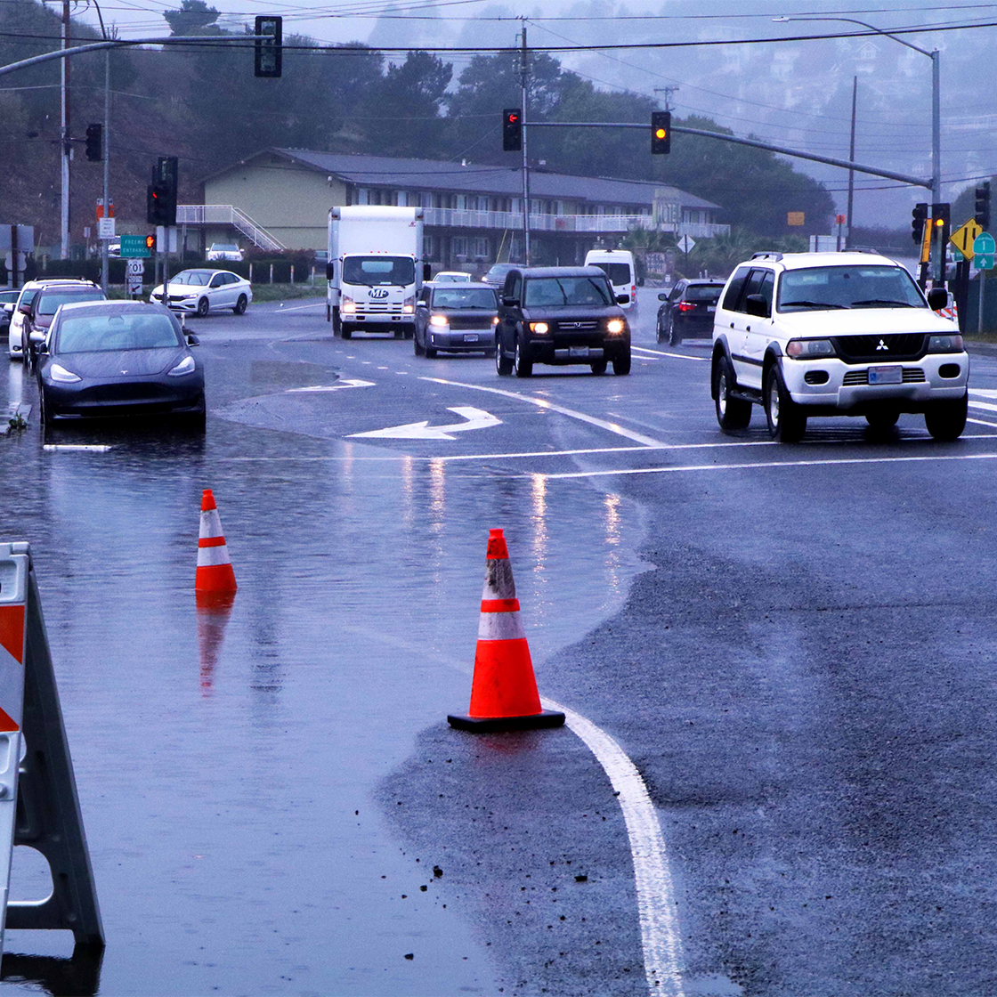 Roadway flooding at the entrance to Manzanita Park & Ride in Tam Valley, Marin County.