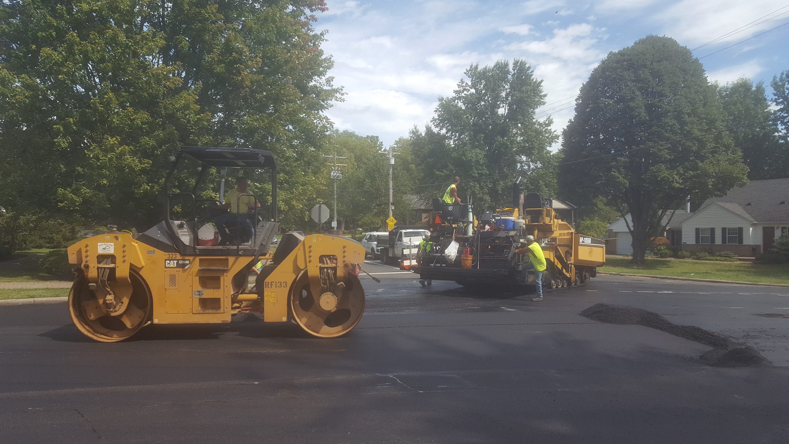 Workers resurfacing a street