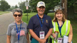 Three Volunteers at the July Parade