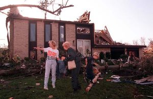 surveying storm damage