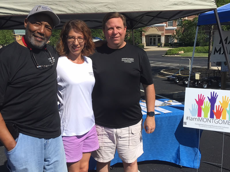 Benny Miles, Carol Gorley, Matthew Vanderhorst at Booth At Farmers Market