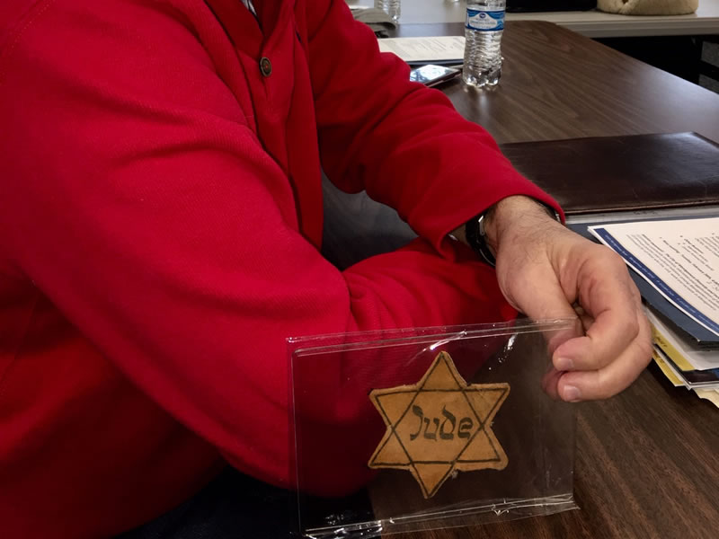 Diversity And Inclusion Committee Member Steve Coppel Showing His Fathers Jewish Badge From The Nazi Era