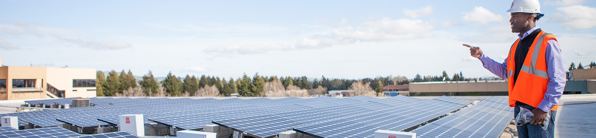 photo of city employee on solar roof