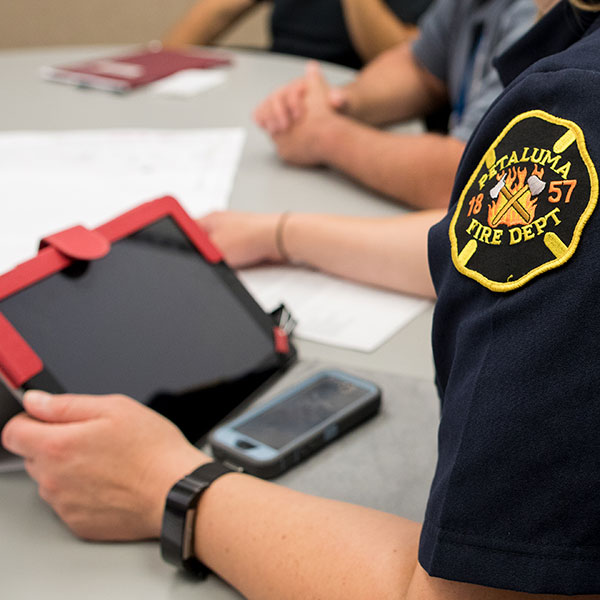 photo of fire employee with tablet