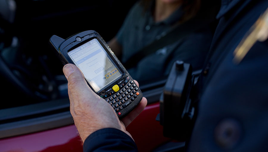 photo of officer with handheld