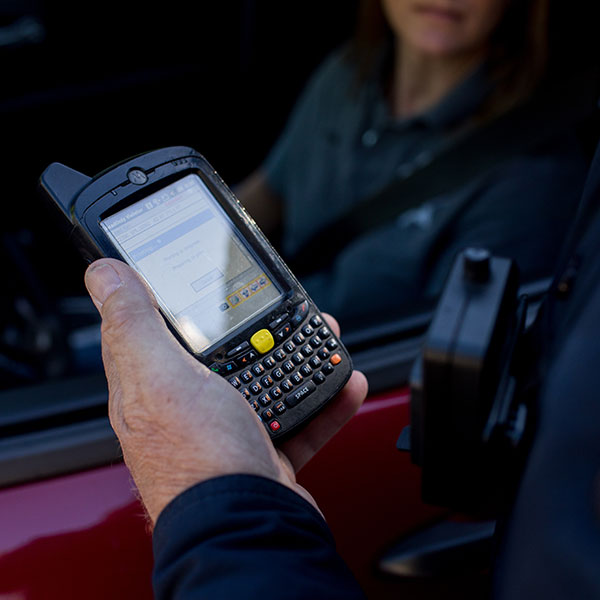 photo of officer with handheld