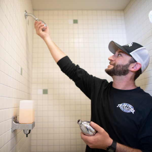 photo of installation of water efficient shower head