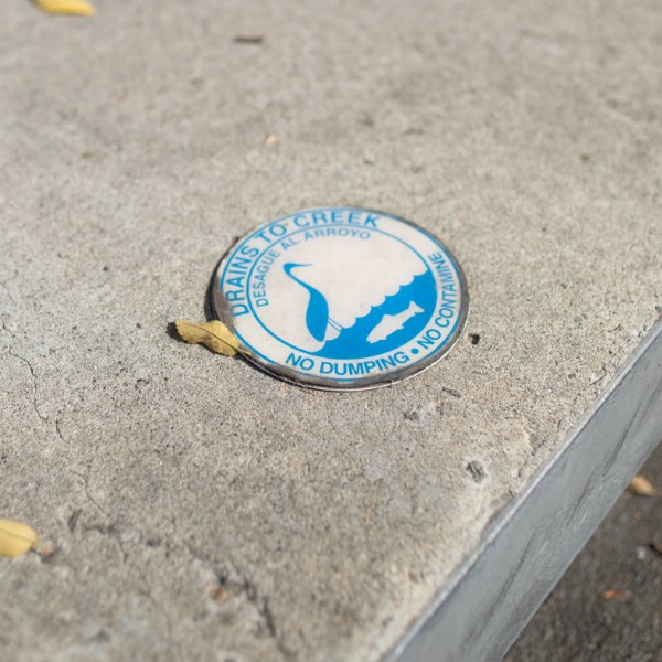 photo of drains to creek emblem