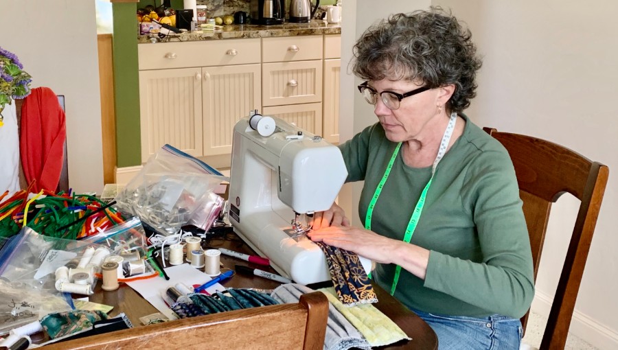 KCGreaney 900×510 KC Greaney at her sewing machine