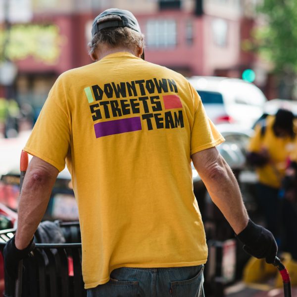 man in yellow tee shirt