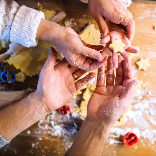 hands holding dough