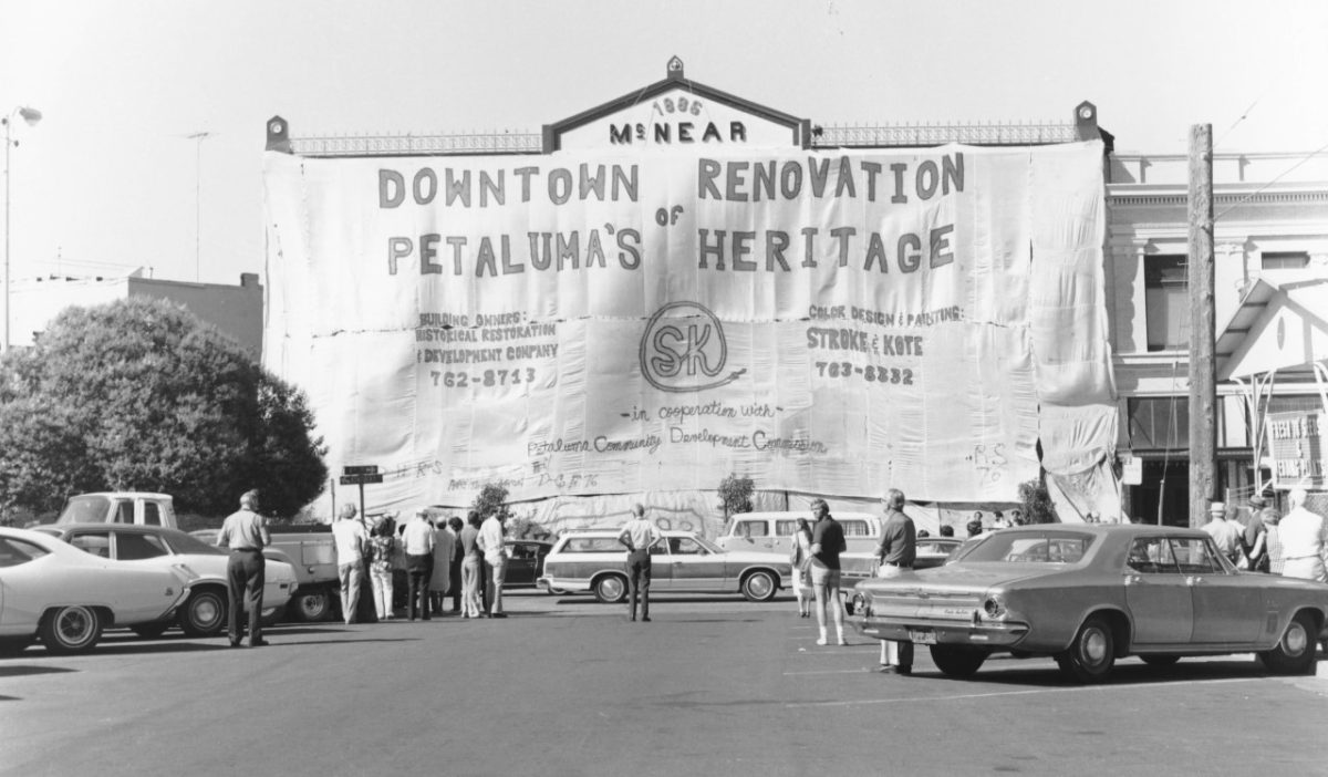 Picture of downtown petaluma with a sign stating Downtown Renovation of Petaluma's Heritage